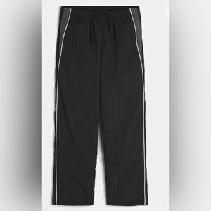 Hollister Black track pants size men’s medium. Black and white